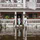 Residents wade through flood waters at their home days after Hurricane Maria made landfall, on Sept. 22, 2017, in Loiza, Puerto Rico. (Alex Wroblewski/Getty Images)